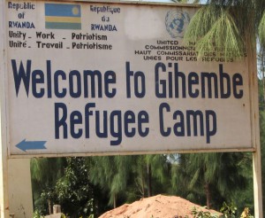 sign that points to the left and says welcome to Gihembe refuge camp