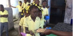 rice and beans, being distributed Haiti children