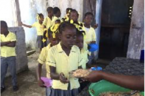 rice and beans, being distributed Haiti children